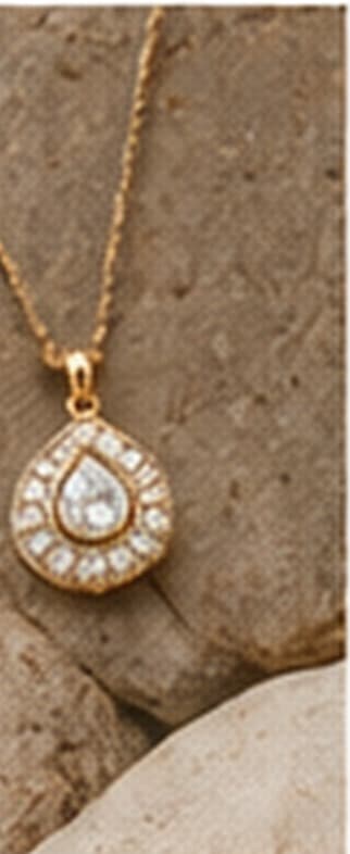 A gold solitaire pendant on a fine chain