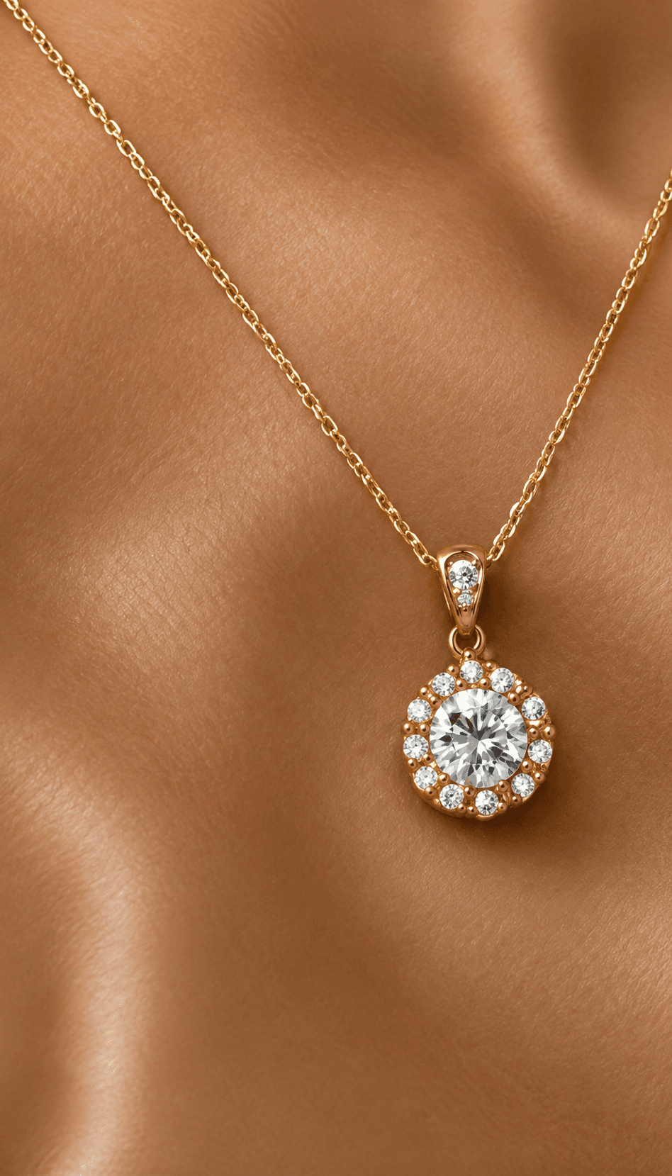 Fine gold chain with a diamond pendant on soft draped fabric