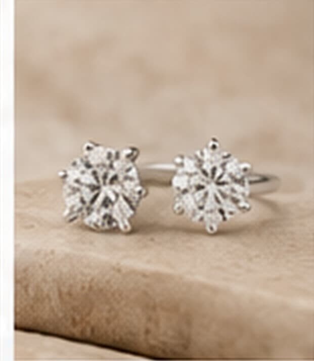 A pair of modern diamond stud earrings